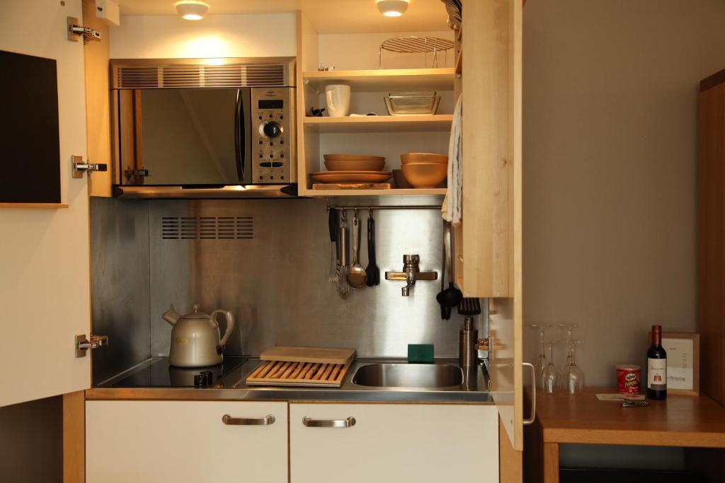 Boardhousing Διαμέρισμα Λουβέν Δωμάτιο φωτογραφία